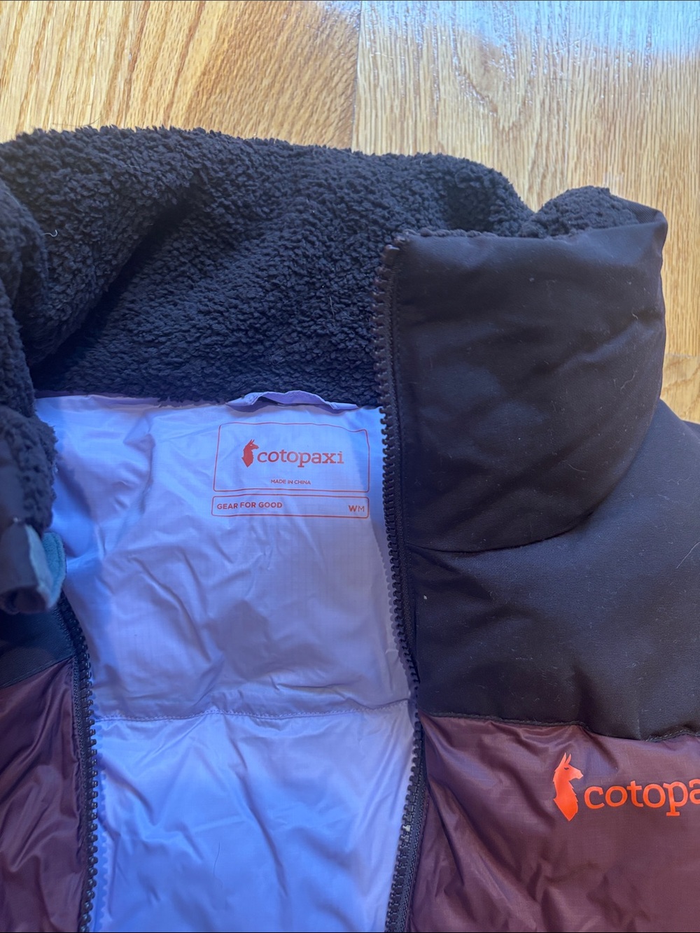 cotopaxi Colorblocked Quilted Puffer Vest in Rust, Dark Brown & Black - Picture 3 of 5